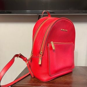 Michael Kors Red backpack in amazing condition.